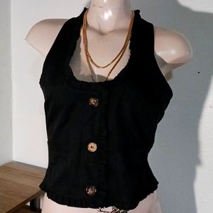 Black. Vest-like shirt